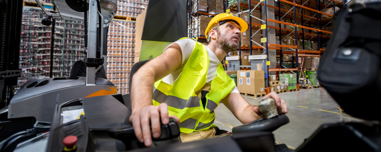 man using forklift in a glasgow warehouse